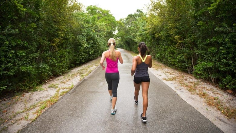 two people walking outside